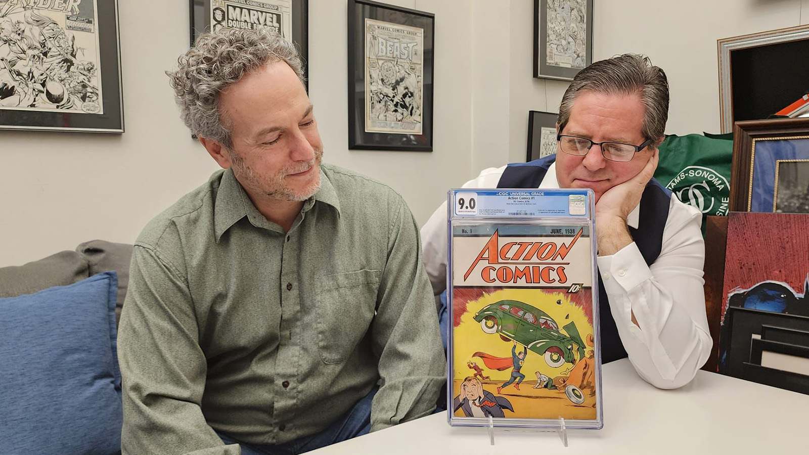 Vincent Zurzolo and partner viewing Action Comics #1 CGC 9.0 graded comic