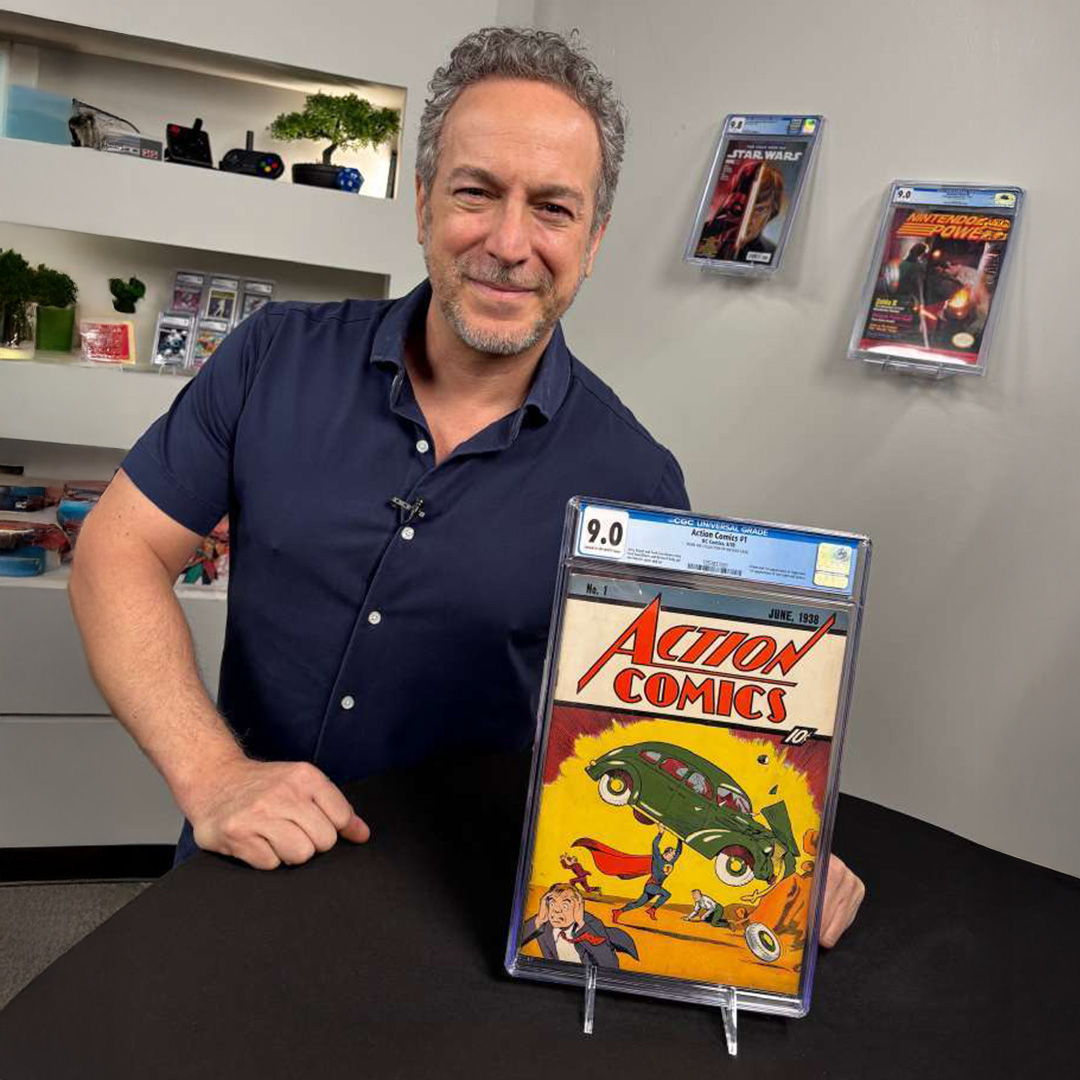 Vincent Zurzolo showcasing Action Comics #1 comic book in a space filled with graded collectibles