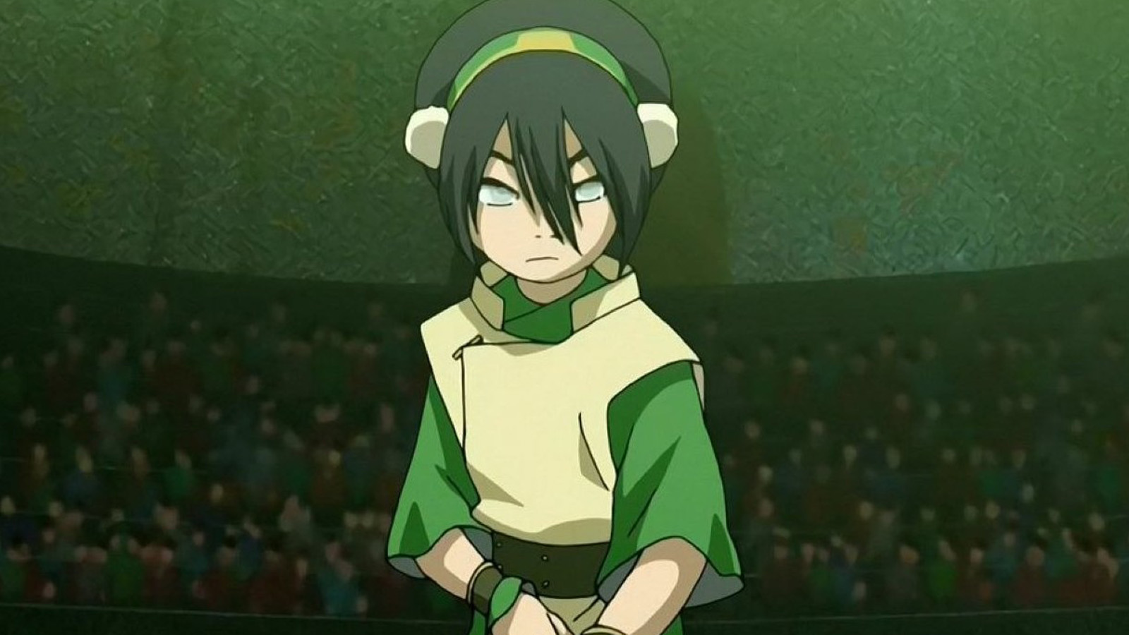 Toph Beifong standing in front of a grand audience